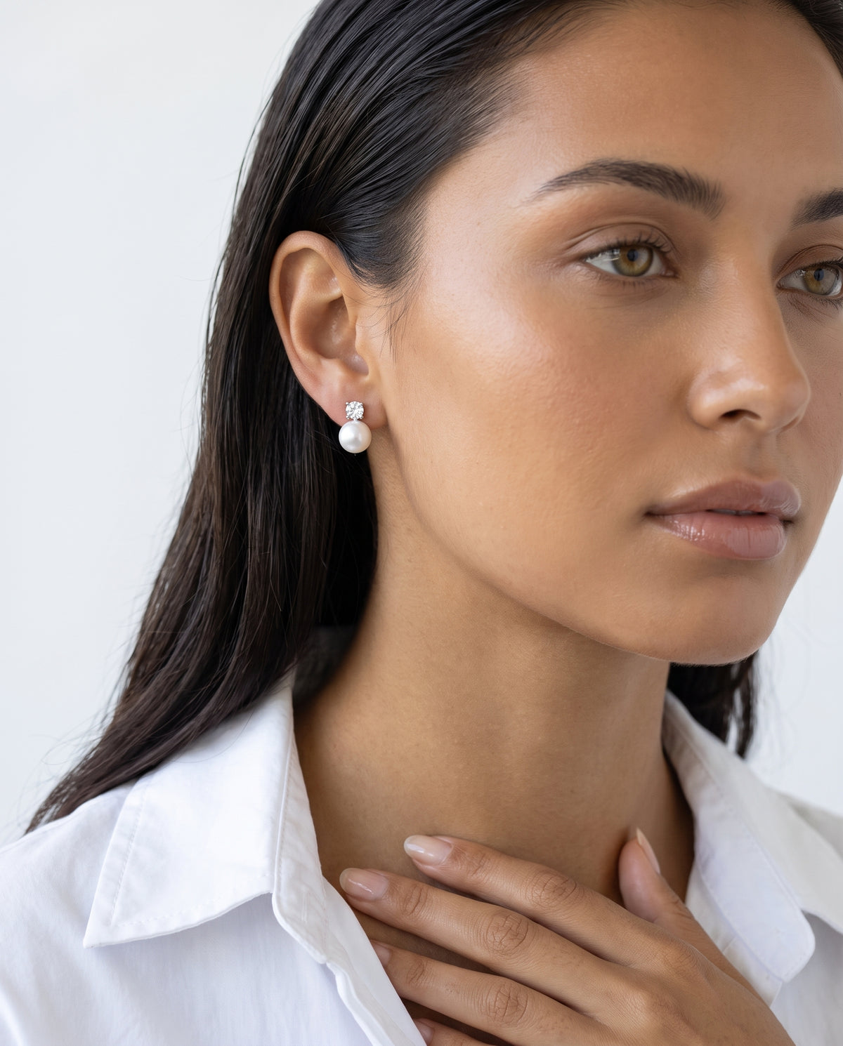 Solitaire and Pearl Studs freshwater pearl earring from ear to collarbone