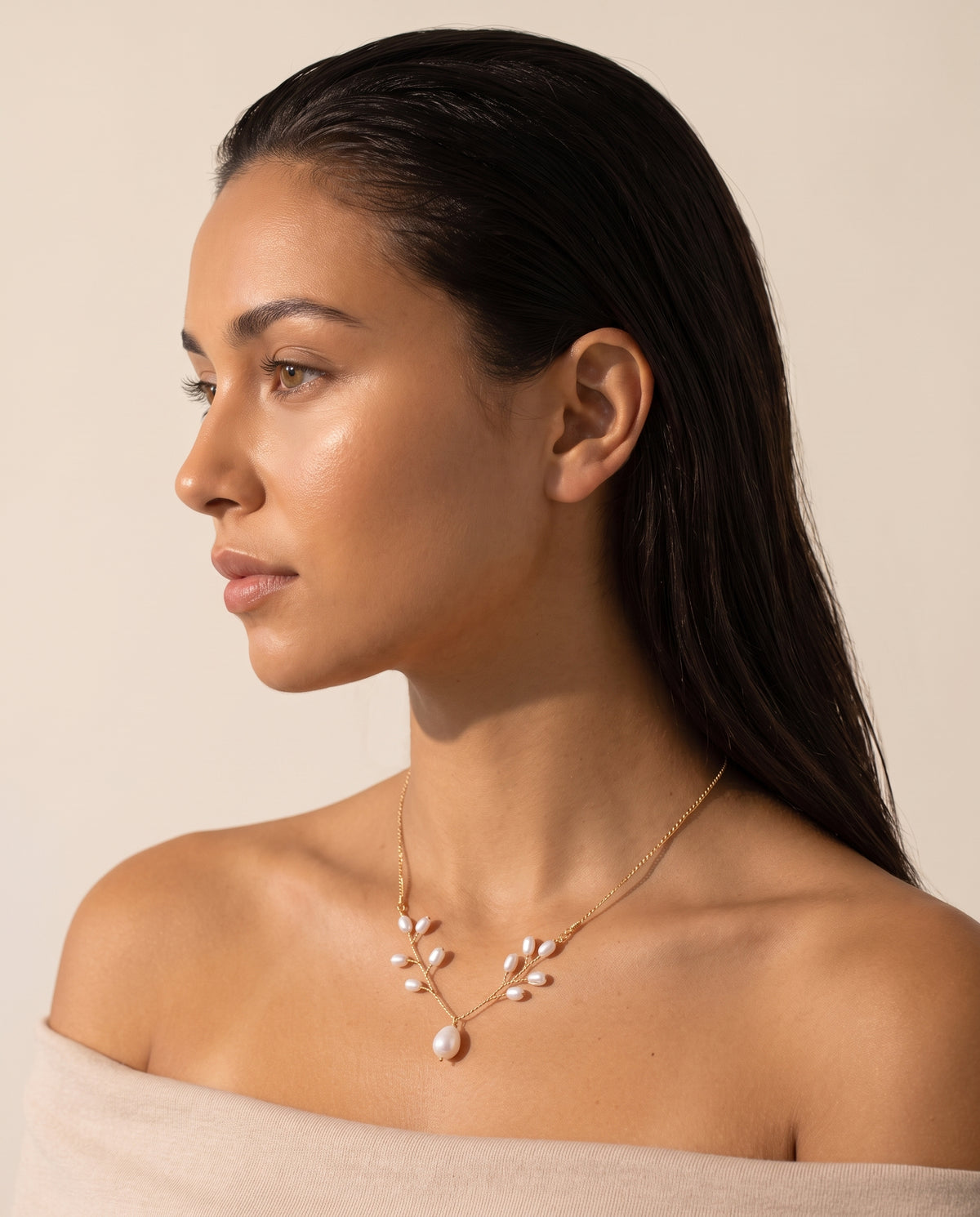 Pearl Vine Necklace worn by a model, side view
