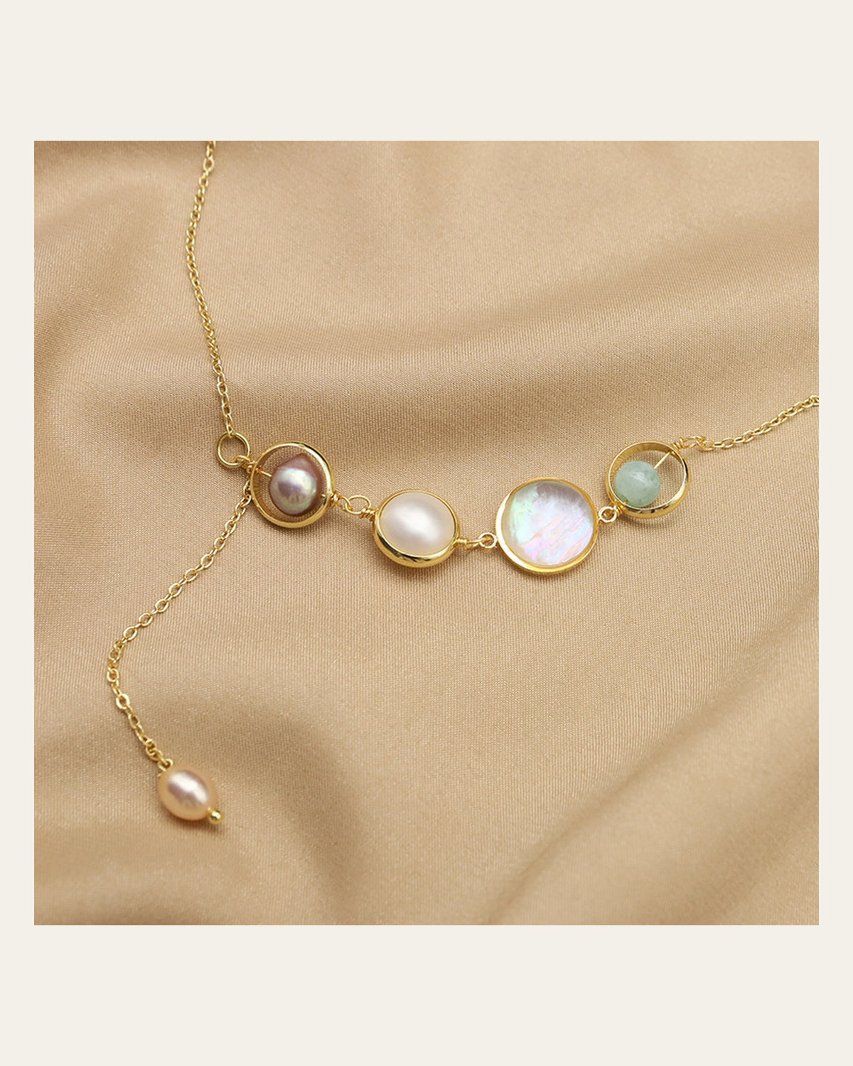 Aquamarine Pearl Lariat Necklace full necklace on champagne silk