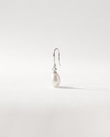 Freshwater pearl teardrop drop earring on a clean white background