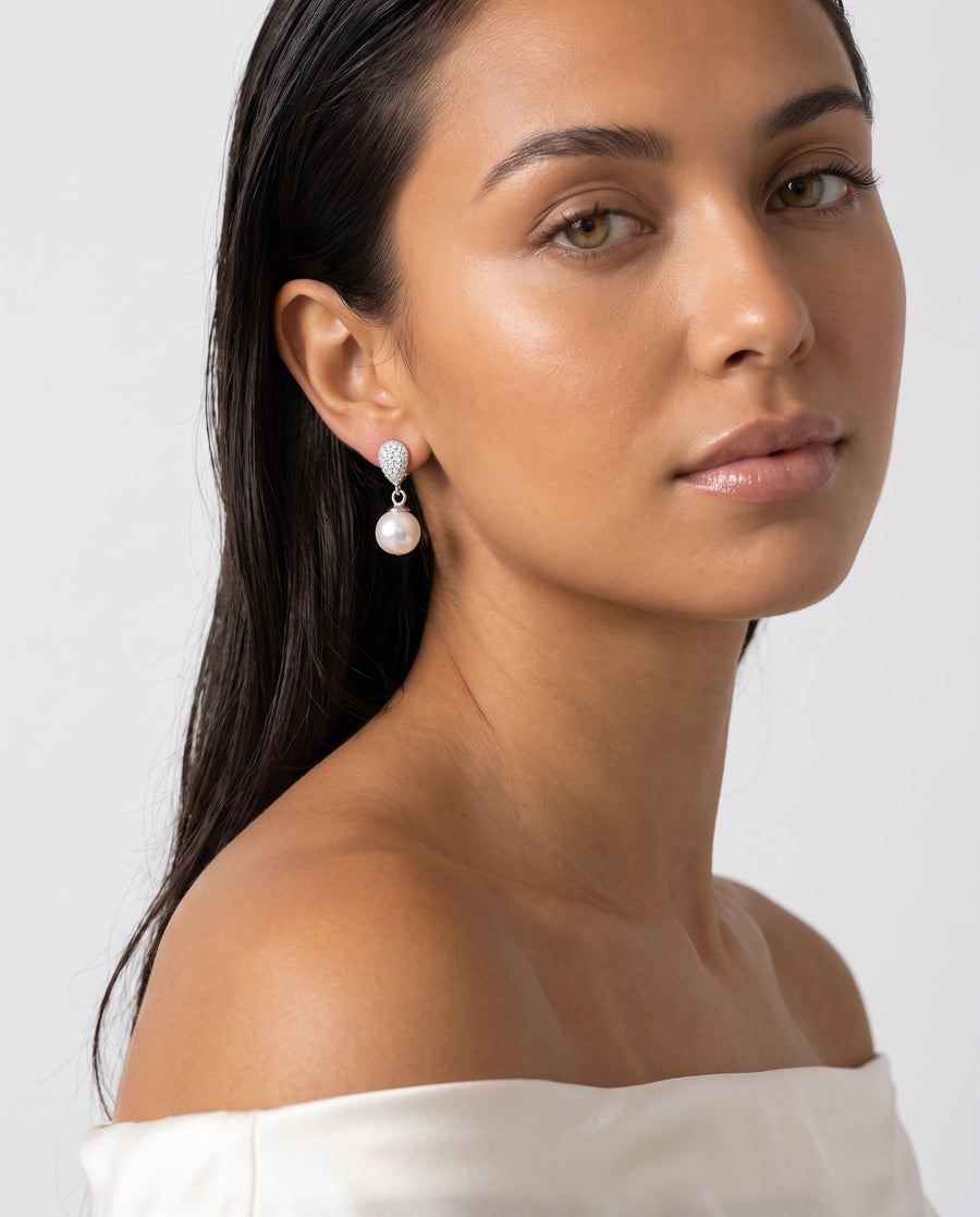 Silver pave pearl drop earring, freshwater pearl, worn on the ear