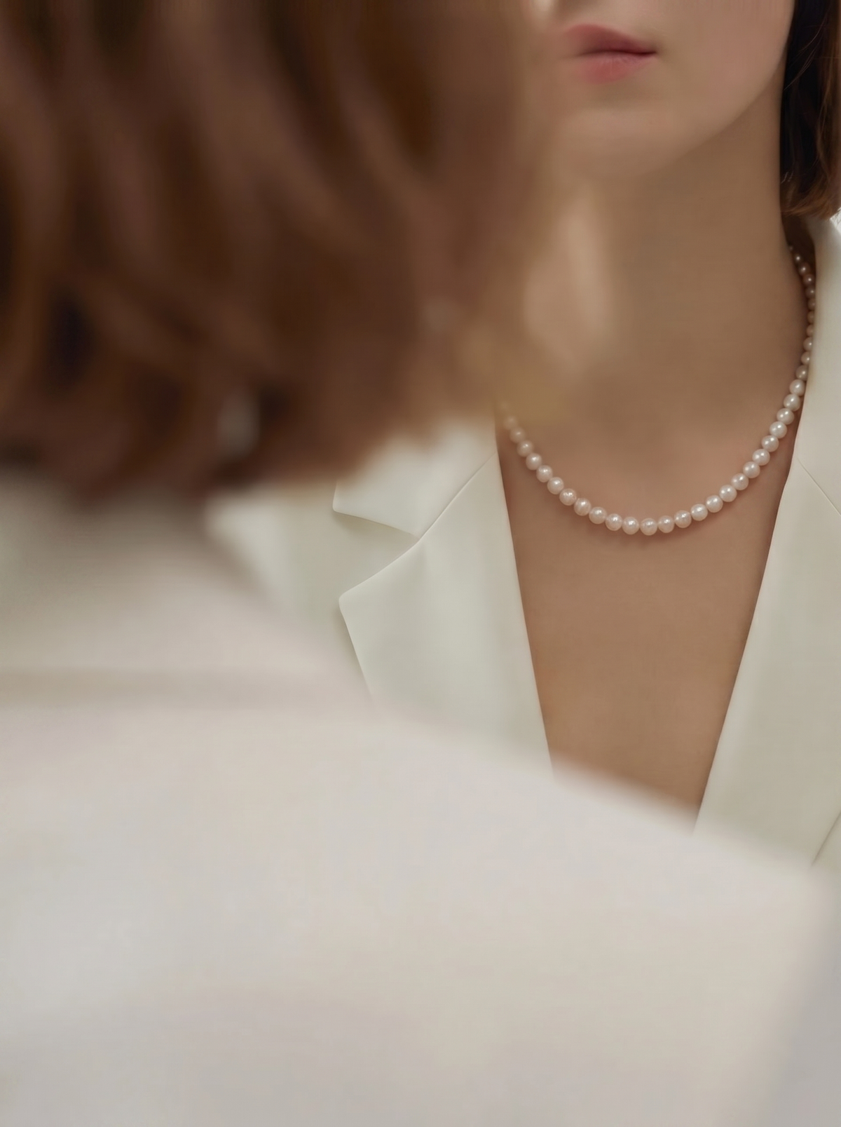 Mirror-like luster detail on 7–7.5mm round freshwater pearls