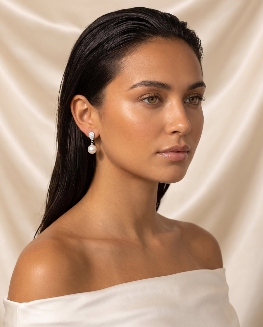 Silver pave pearl drop earring, freshwater pearl, editorial on champagne silk