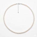 Dainty 4–4.5mm AAAA freshwater seed pearl necklace, adjustable princess length — full view