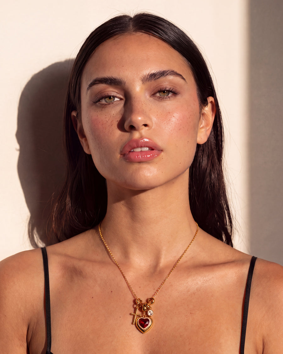 Front view of the Red Heart Charm Necklace worn on its own at full 45 cm length