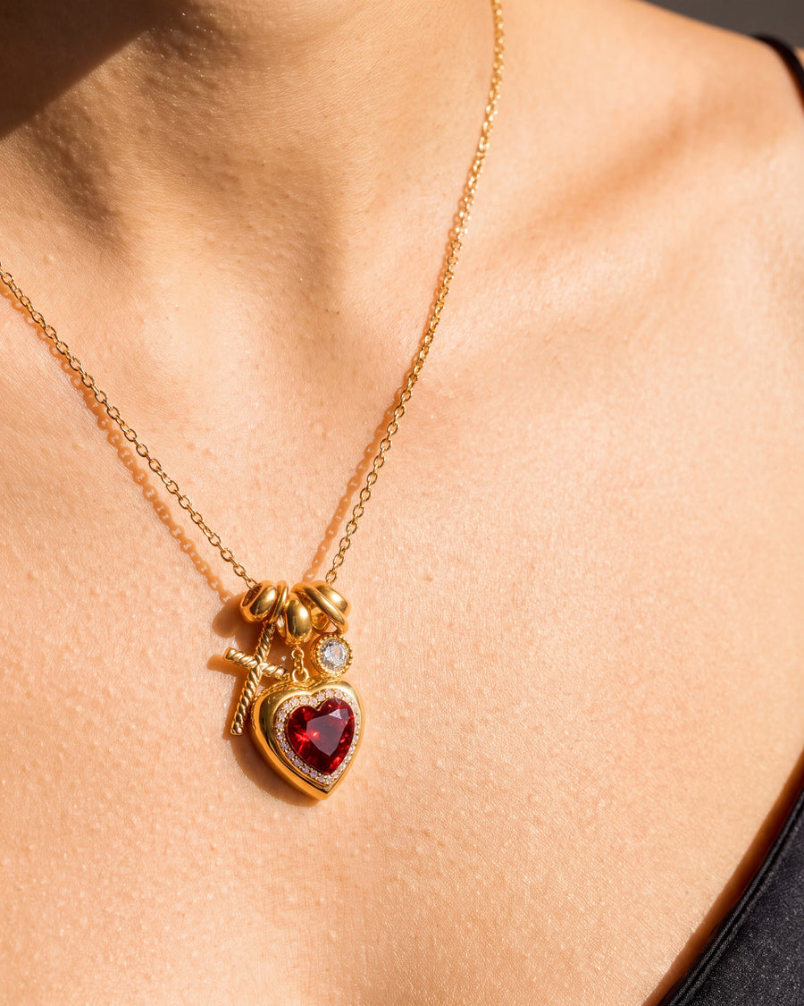 Model wearing the necklace, the cluster sitting on the upper sternum below the collarbone