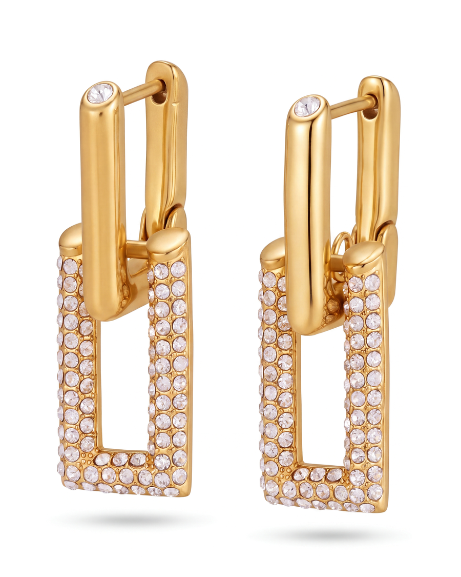 The pair of pavé link drop earrings angled, showing the hinge and the connecting ring