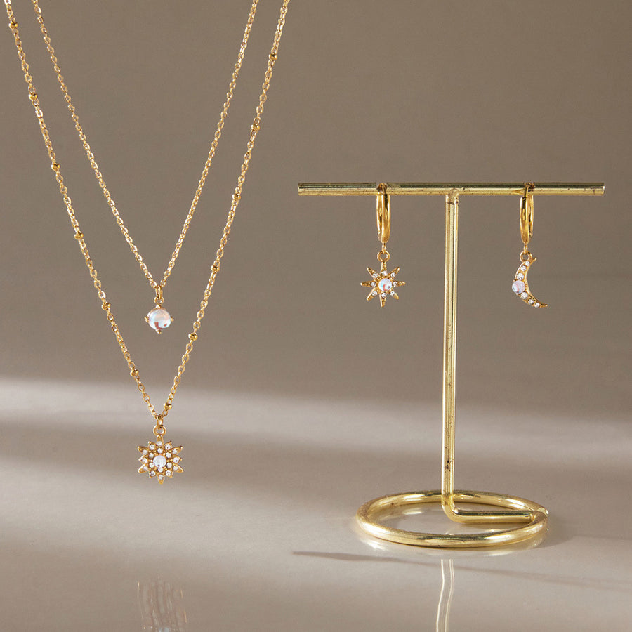 Opal starburst layered necklace worn in natural light, lifestyle view