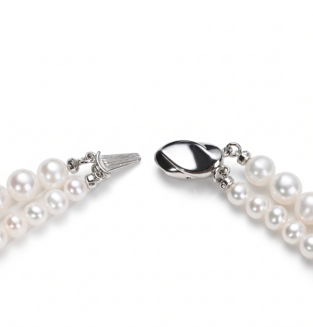 Double-layer pearl bracelet — silver clasp detail