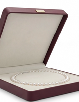 Luxe Heirloom AAAA freshwater pearl necklace shown worn — princess length
