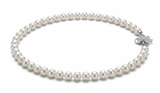 Premium AAAA round pearl necklace shown worn at the neckline