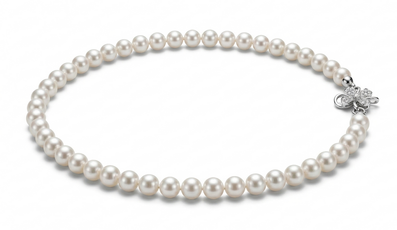 Premium AAAA round pearl necklace shown worn at the neckline
