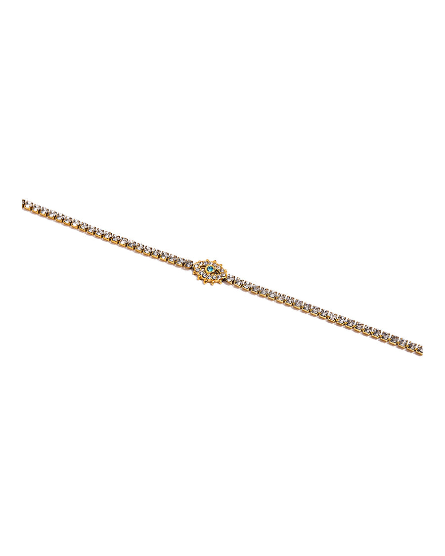 Clear crystal tennis bracelet with a pave evil eye centre on pure white