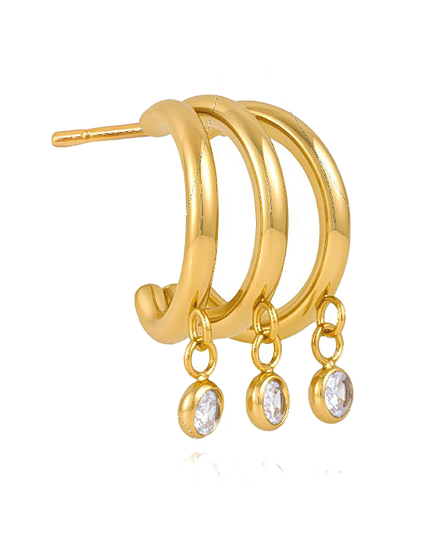 Gold triple hoop earring on white — three fine half-hoops on one post with three bezel-set crystal drops