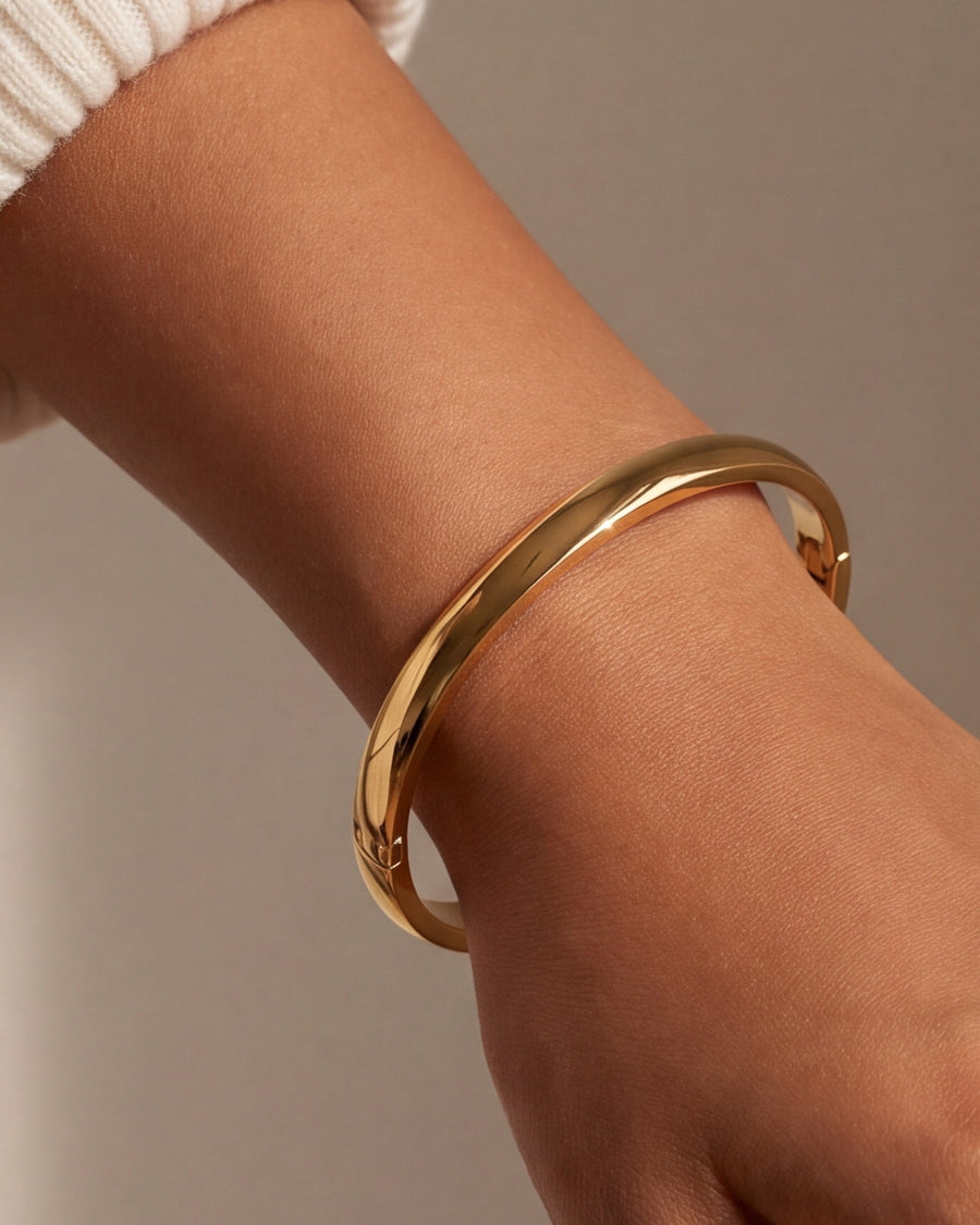 Close-up of the domed band and polished finish on the wrist