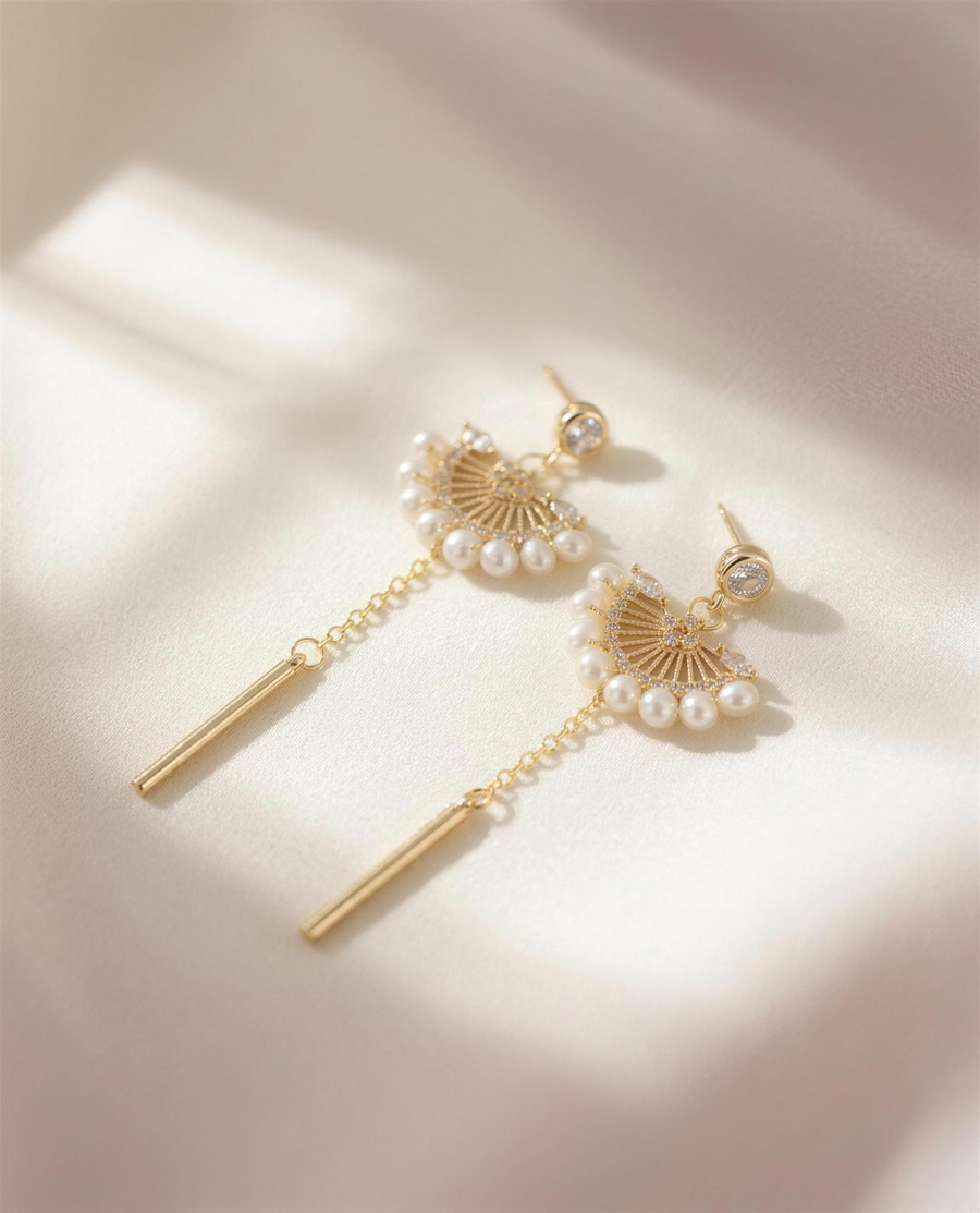 Freshwater pearl fan drop earrings in our Ontario atelier.
