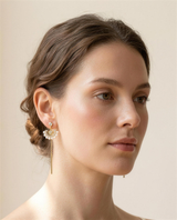Freshwater pearl fan drop earrings worn on the ear, three-quarter view.