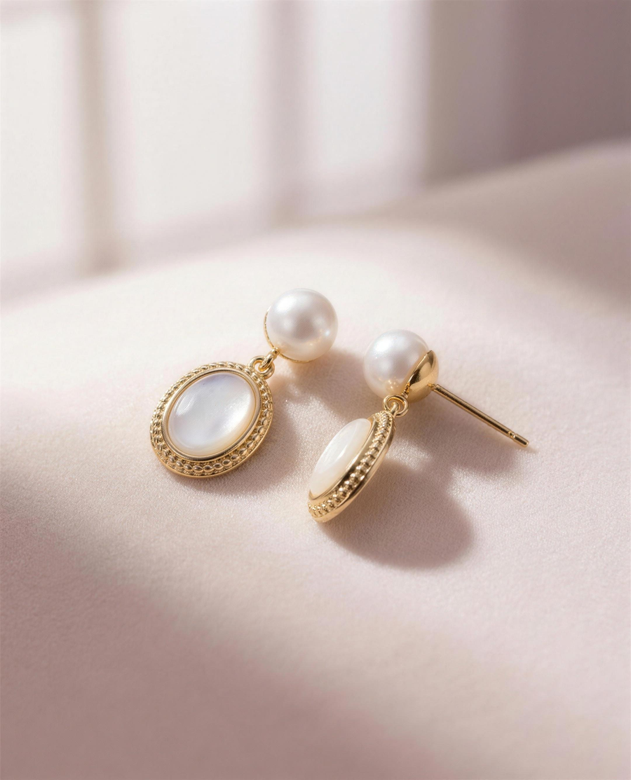 Mother of pearl freshwater drop earrings in our Ontario atelier.
