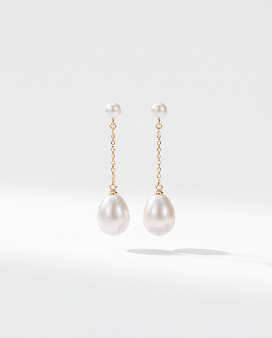 Fine Chain Pearl Drops freshwater pearl earring on a clean white background
