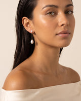 Fine Chain Pearl Drops freshwater pearl earring worn on the ear