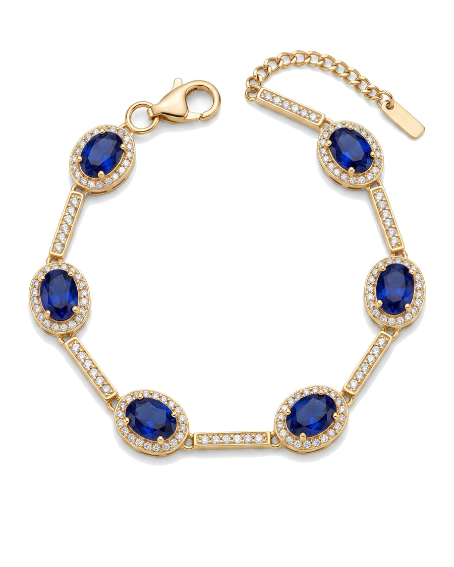 Sapphire halo bracelet in 18k gold plated stainless steel, six blue stations, on white