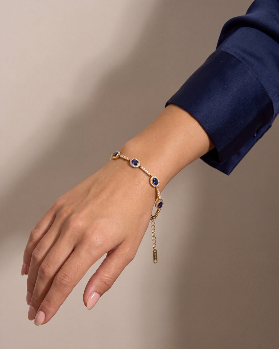 The bracelet articulating around the turned wrist
