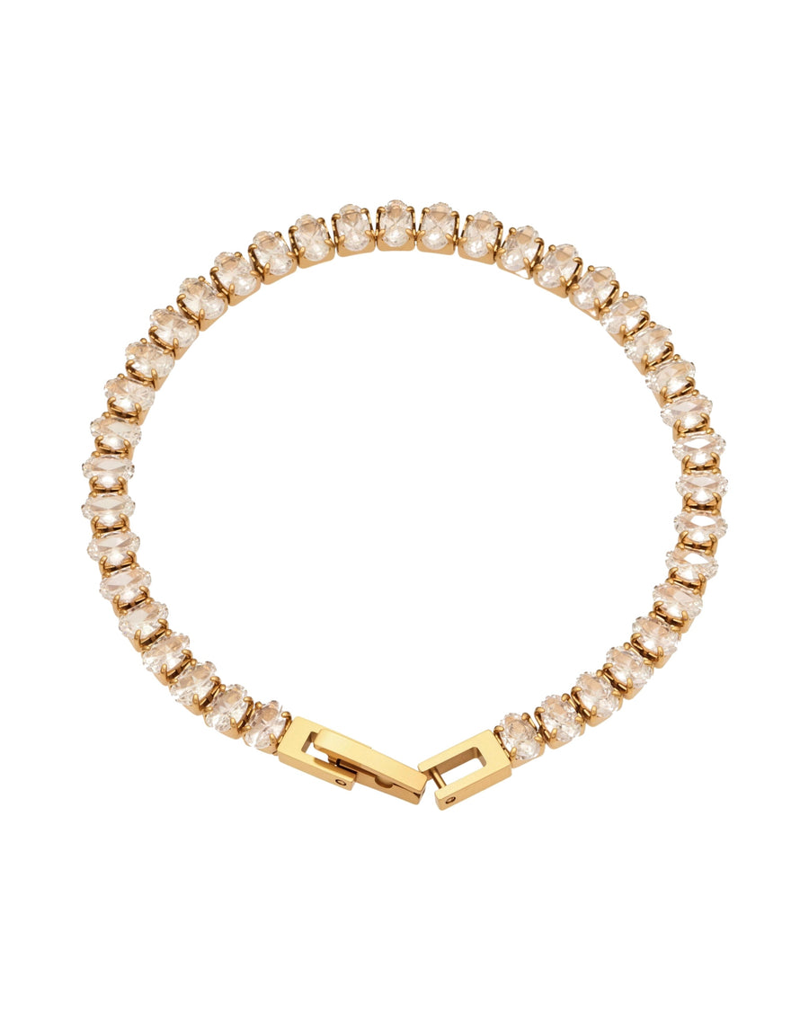 Zircon tennis bracelet 17 cm in 18k gold plated stainless steel, shown flat on white