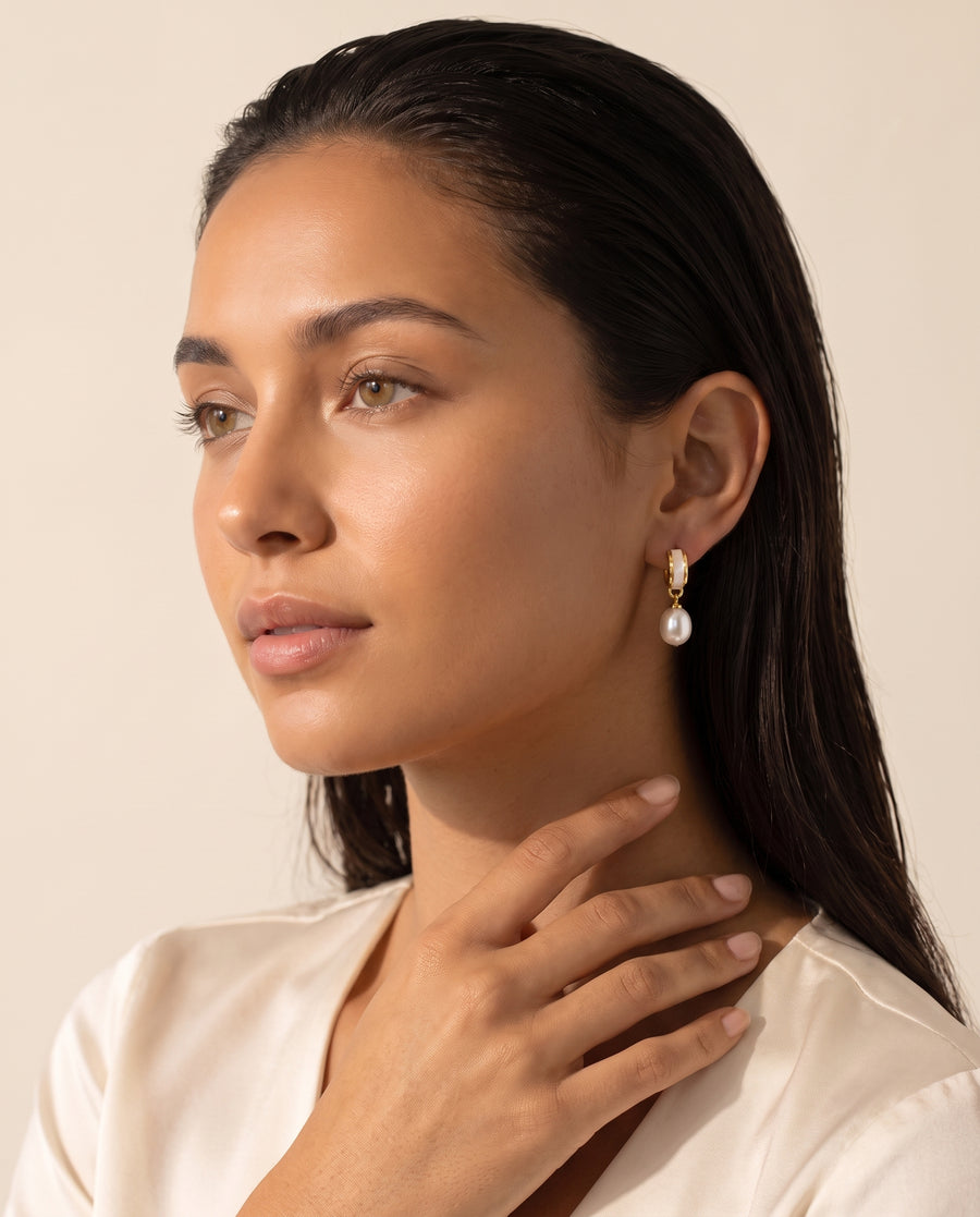 Shell Inlay Pearl Huggie Drops freshwater pearl earring from ear to collarbone