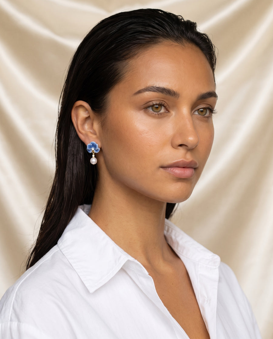 Blue Enamel Bloom Pearl Drops freshwater pearl earring editorial portrait on champagne silk