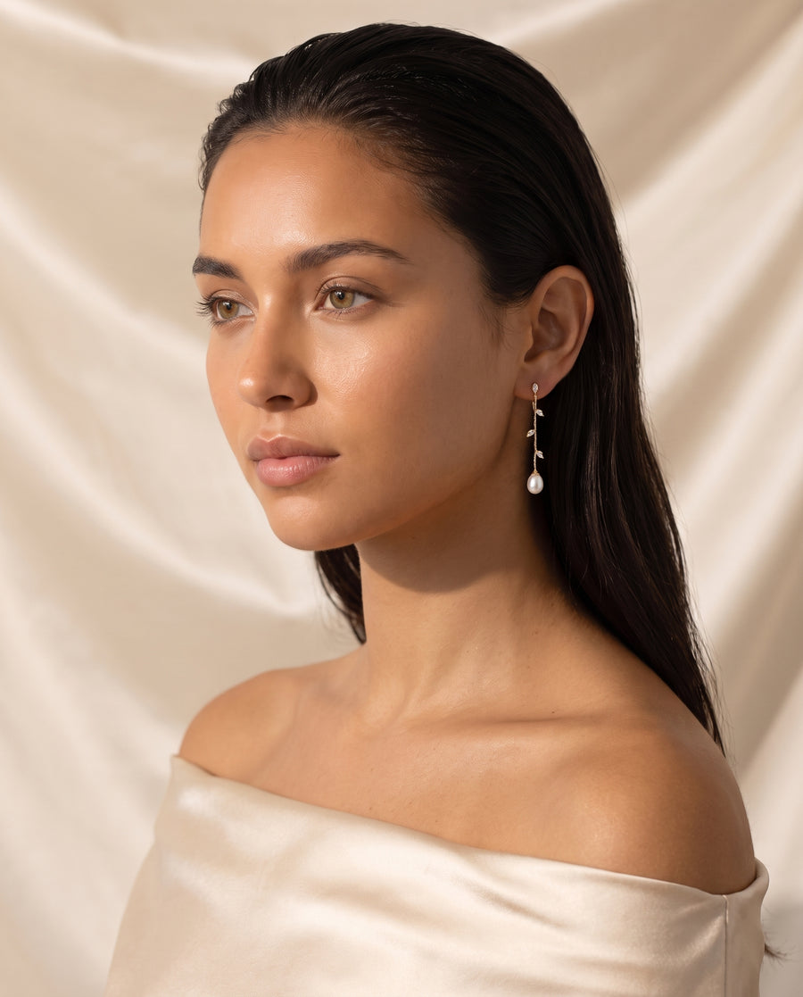 Gold Vine Pearl Drops freshwater pearl earring editorial portrait on champagne silk