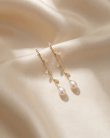 Gold Vine Pearl Drops freshwater pearl earring draped on champagne ivory silk