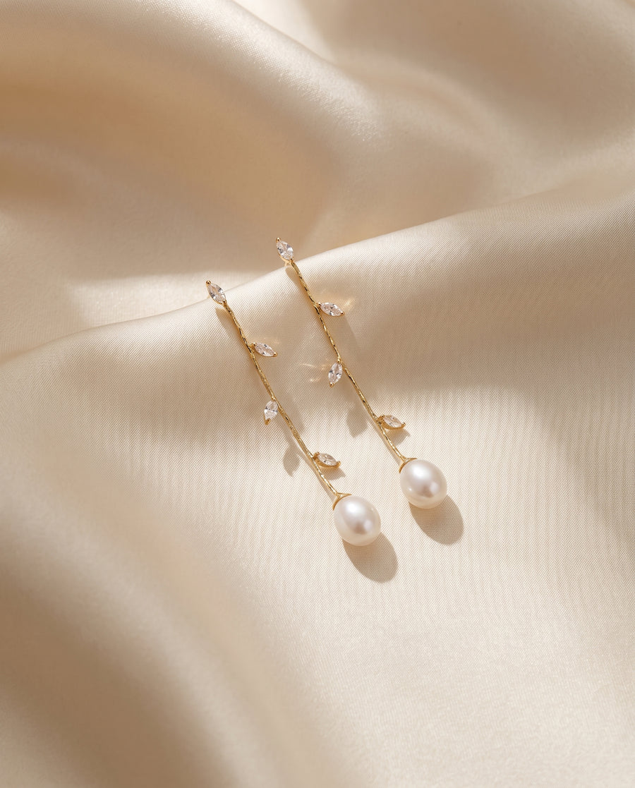Gold Vine Pearl Drops freshwater pearl earring draped on champagne ivory silk