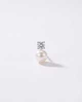 Solitaire and Pearl Studs freshwater pearl earring on a clean white background