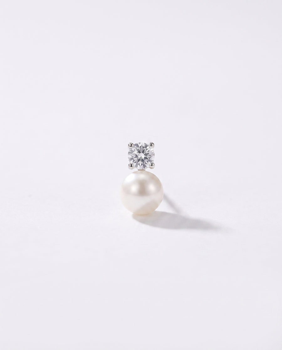Solitaire and Pearl Studs freshwater pearl earring on a clean white background