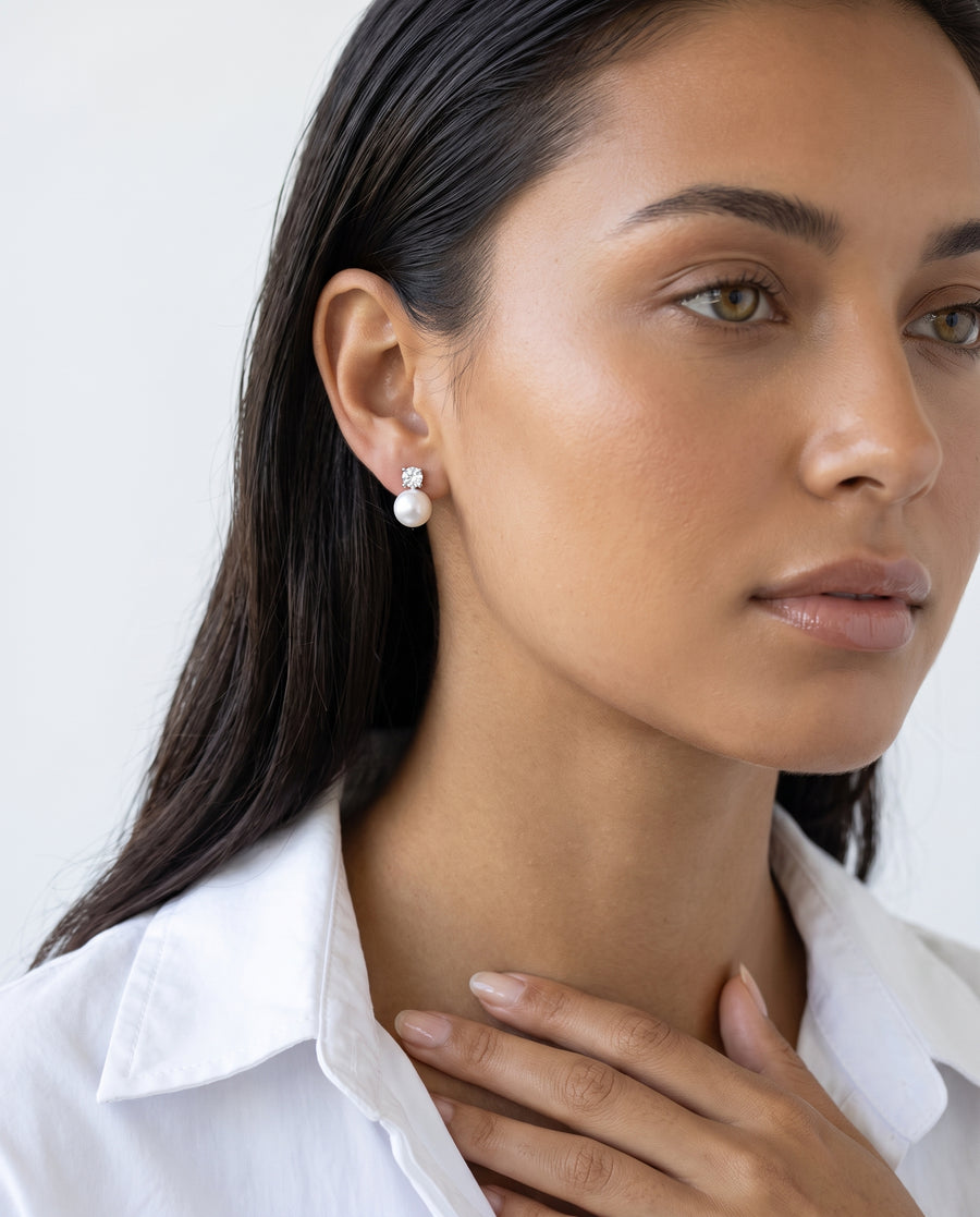 Solitaire and Pearl Studs freshwater pearl earring from ear to collarbone