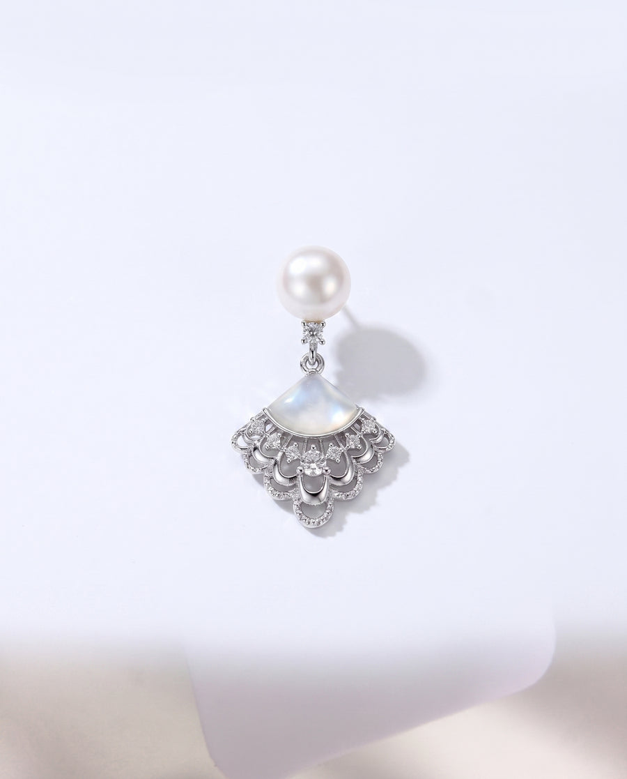 Fan Shell Pearl Drops freshwater pearl earring on a clean white background