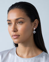 Fan Shell Pearl Drops freshwater pearl earring worn on the ear