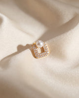 Square Pave Pearl Studs freshwater pearl earring draped on champagne silk