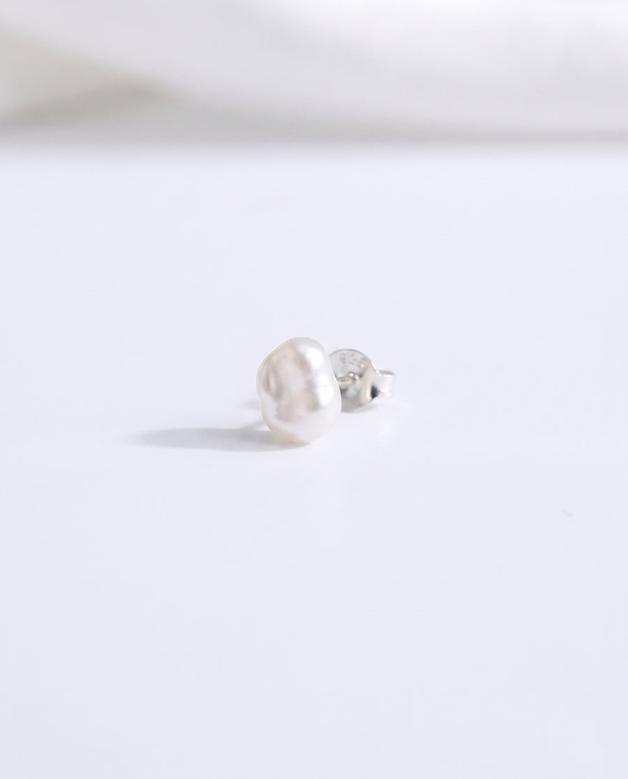 Petite Baroque Pearl Studs freshwater pearl earring on a clean white background