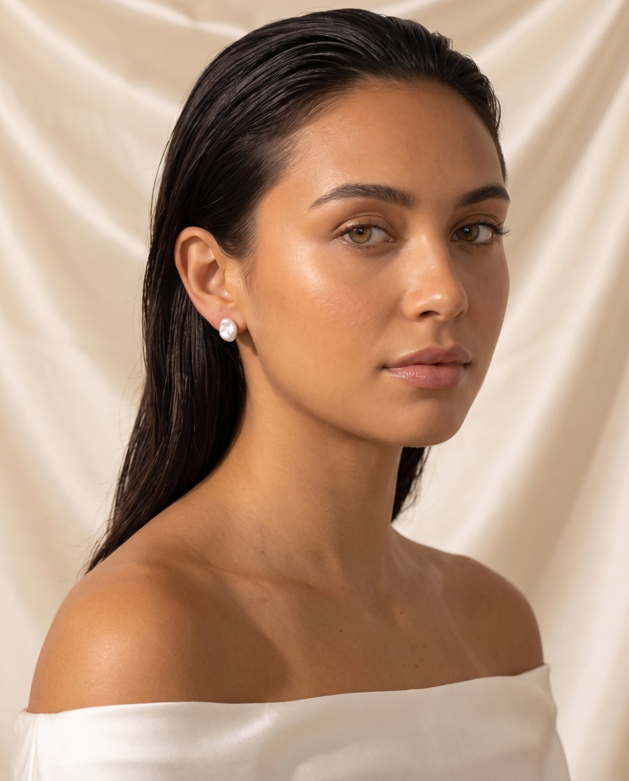 Petite Baroque Pearl Studs freshwater pearl earring editorial on champagne silk