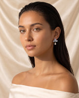Blue Petal Pearl Studs freshwater pearl earring editorial on champagne silk