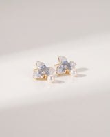 Blue Petal Pearl Studs freshwater pearl earring on a glossy pedestal