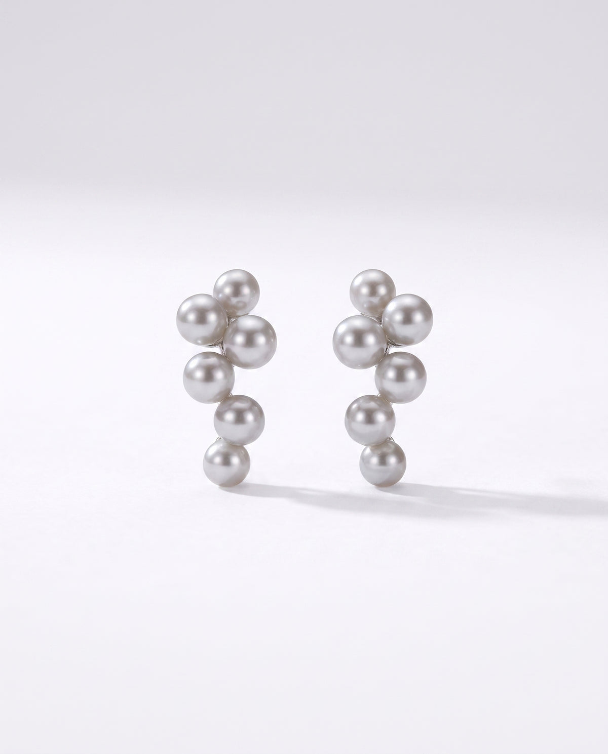 Grey Pearl Climber Studs freshwater pearl earring on a clean white background