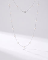 Pearl Station Necklace freshwater pearl necklace on a clean white background