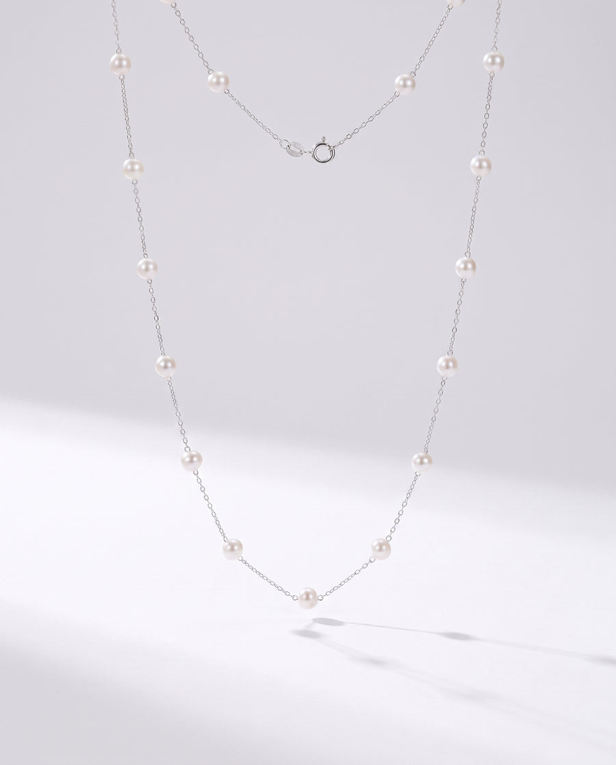 Pearl Station Necklace freshwater pearl necklace on a clean white background