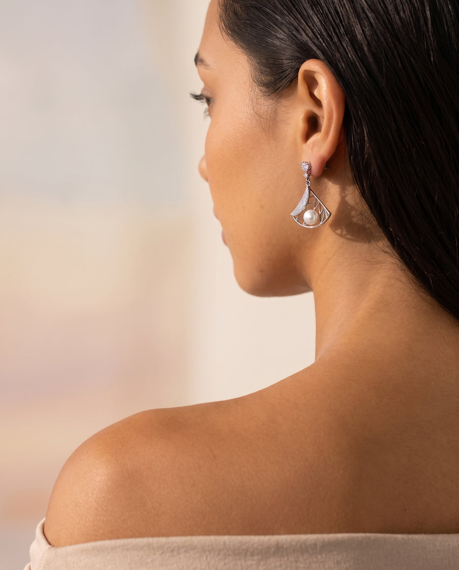 Deco Fan Pearl Drop Earrings over the shoulder view