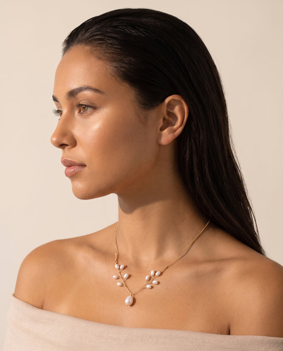 Pearl Vine Necklace worn by a model, side view