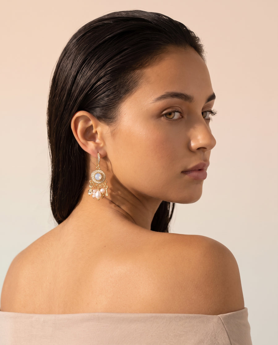Vintage Medallion Pearl Drops worn by a model, side view