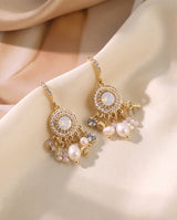 Vintage Medallion Pearl Drops draped on champagne silk